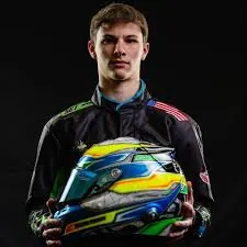 Shane Ready holding his helmet